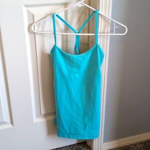 Women's Lululemon Aqua blue workout top. Size 4